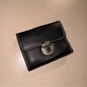 black leather tri-fold wallet silver-tone clasp closure.